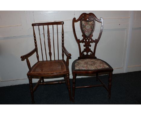 A 20th century hall chair with fretted and padded back splat, together with a cane seat stick back elbow chair