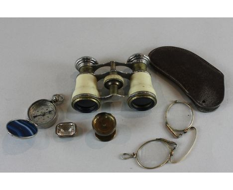 A pair of opera glasses, a cased pair of pince-nez, a compass, a miniature brass pot and a gilt metal mounted glass intaglio