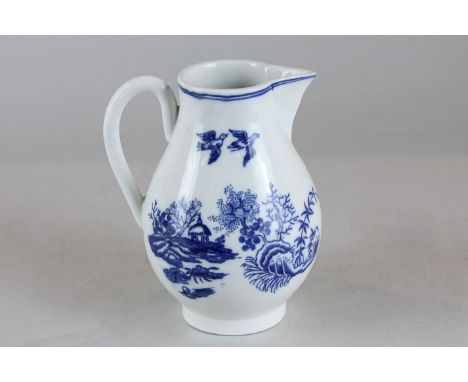 An 18th century Caughley sparrow beak porcelain cream jug, hand painted in blue in the Chinese taste, 11.5cm high