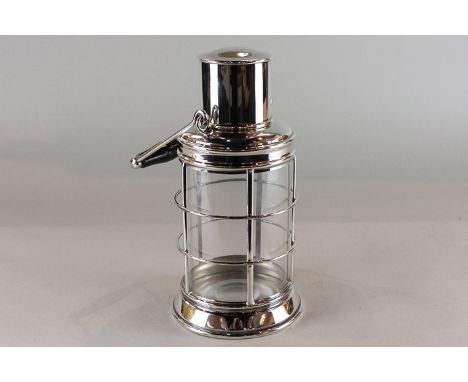 An Asprey silver plated novelty lantern cocktail shaker in the form of a hand held lantern, stamped marks to base, height 27c