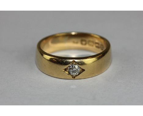 An 18ct gold and diamond ring set with an old cut diamond, 6.5gms gross 
