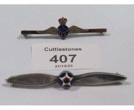 AN ANTIQUE SILVER AND ENAMEL PROPELLER BROOCH AND ANTIQUE SILVER ENAMEL RAF BROOCH