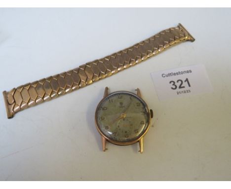A VINTAGE 9CT GOLD GENTLEMANS TUDOR WRISTWATCH WITH MANUAL WIND MOVEMENT, ALONG WITH A PLATED EXPANDING STRAP