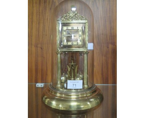 A DOMED MANTLE CLOCK 