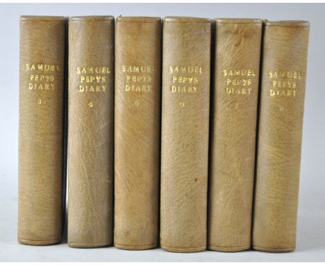 A group of leather bound volumes, to include The Diary of Samuel Pepys