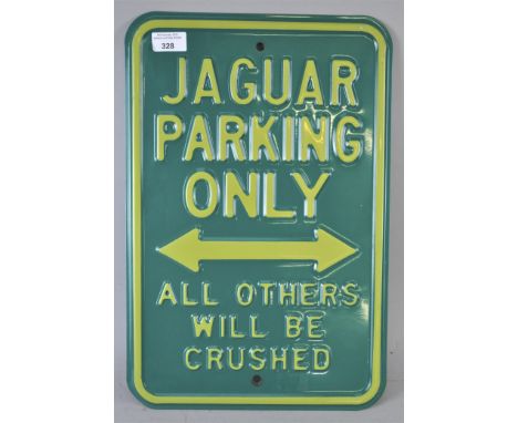 A modern enamel decorative sign 'Jaguar Parking Only', 45cm x 30cm