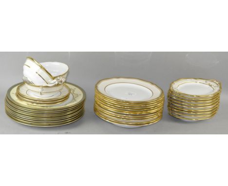 A Spode part service, pattern Y8558, comprising six 91/2" plates, six dessert plates, three soup bowls and stands and nine ov