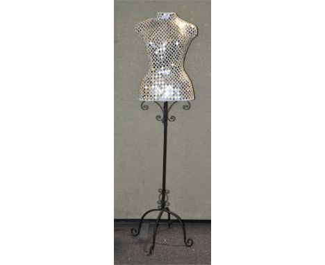 A mirror inlaid decorative mannequin on a wrought iron stand, 139cm high