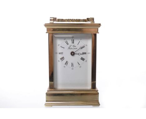 TWENTIETH CENTURY BRASS CARRIAGE CLOCK
by L'epee, the signed single train movement with lever platform escapement, the white 