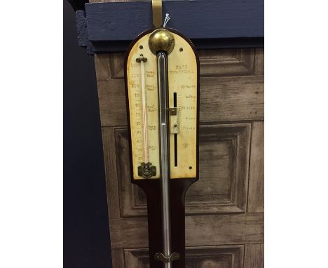 LATE NINETEENTH CENTURY MAHOGANY STICK BAROMETER
by Carr, Swaffham, with arched ivory indicator and thermometer, domed mahoga