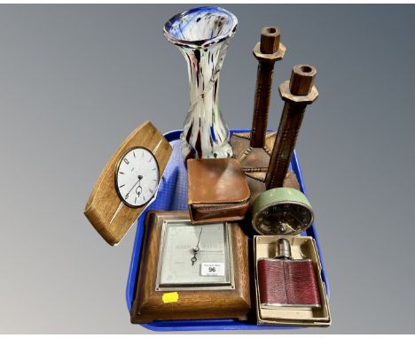 A tray containing a mid-20th century mantel clock, a pair of Edwardian oak candlesticks, a barometer, a hip flask, gent's tra