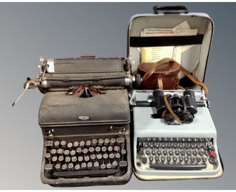 A Lettera 22 typewriter, a Royale typewriter and a pair of Lumerlite Super 10 x 32 binoculars in leather case 