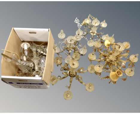 A collection of six antique metal and glass light fittings with glass drops. (AF)