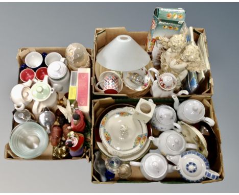 Three boxes containing assorted teapots including Royal Albert, a Royal Albert Country Roses dish, mugs, contemporary cherub 