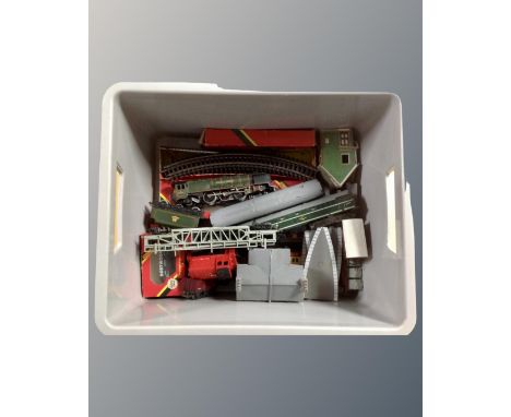 A box containing Hornby rolling stock including Duchess of Montrose engine, track, buildings etc.