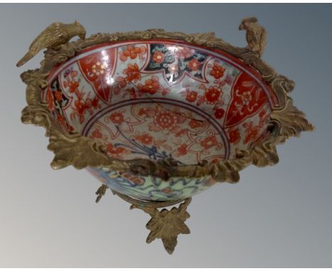 Two Japanese vases (AF), together with a further Chinese porcelain vase converted to a table lamp and an Imari gilt metal mou