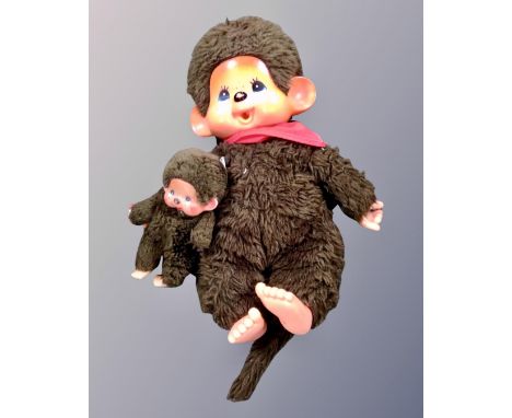 A Chad Valley monkey toy together with a miniature version by H. C. F.