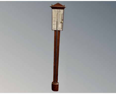 An antique continental stick barometer by Julius Nissen.