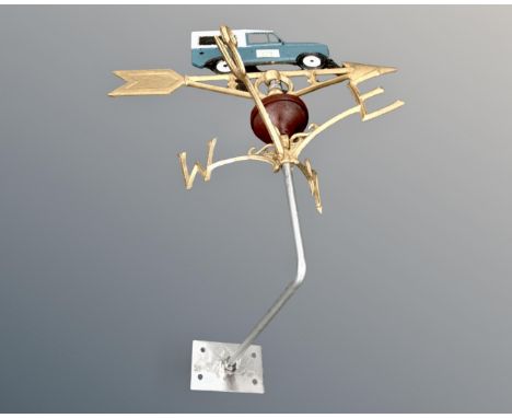 A cast iron Land Rover weather vane.