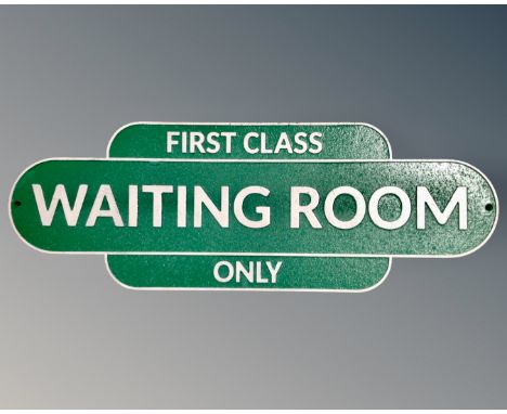A cast iron First Class Waiting Room wall plaque.