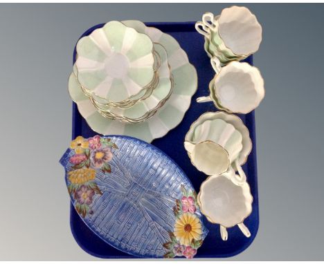 An English 24 piece bone china tea service together with a Maling shallow dish.
