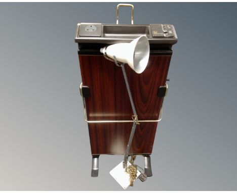 A 20th century Herbert Terry angle poise lamp together with a Corby club edition trouser press.
