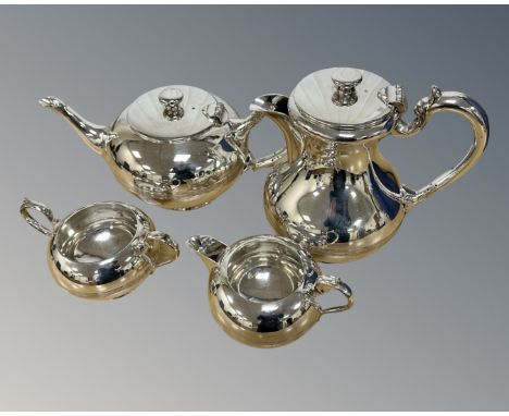 A silver plated four piece tea service by Walker &amp; Hall. 