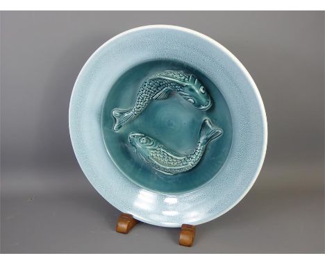 Alan White Poole Pottery Carp Bowl, turquoise glaze, with moulded carp to well of the bowl, approx 33 cms diameter.