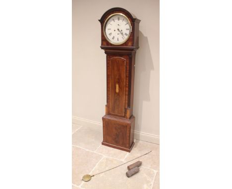 A George III mahogany cased eight day longcase clock, the arched hood with inlaid Prince of Wales feather spandrels below the