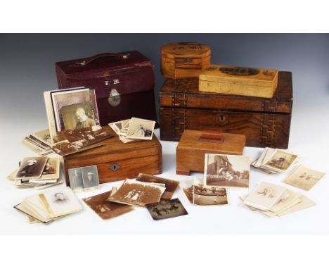 An Edwardian Moroccan red leather stationery box, the fall front concealing a compartmentalised interior, 25cm wide (at fault