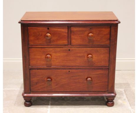 A Victorian mahogany chest of drawers, of cottage proportions, formed from two short over two long drawers, raised upon bun f