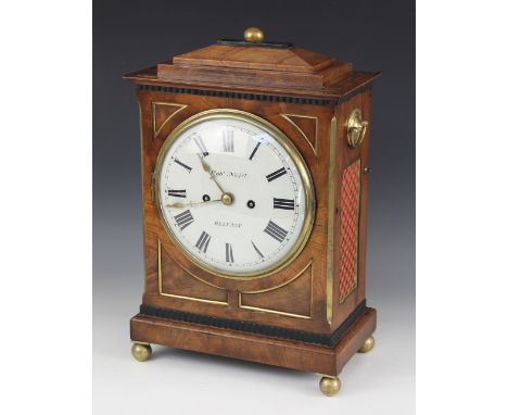 A Regency mahogany bracket clock by Robert Neill, Belfast, the stepped cornice with a sphere finial above brass side swing ha