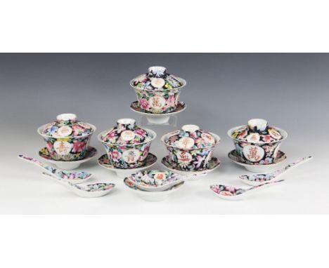 A Chinese famille noir part tea service, 20th century, comprising four gaiwan cups, covers and saucers, with two further stan
