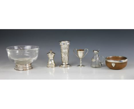 A selection of silver and silver mounted tableware, to include a silver pepper grinder, Roberts &amp; Belk, Birmingham 1981, 