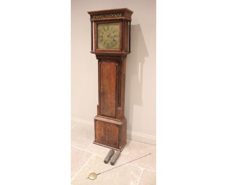 A George III oak cased eight day longcase clock, signed ‘Barker, Wigan’, the flat top hood with a glass frieze over painted w