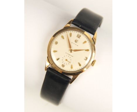 A gents 9ct gold Cyma ‘Cymaflex’ wristwatch, the round with dial with Arabic numerals and baton marks with subsidiary seconds