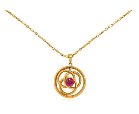 A GOLD PENDANT ON CHAIN The openwork pendant set with a synthetic ruby coloured stone, marked for 22k gold, additional Chines