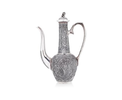 A SILVER WINE EWER
Silver, repousse, chasing and casting, in flask form, long curled spout and handle, tapered globular body,