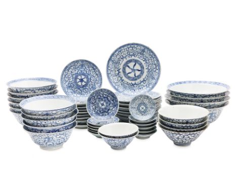 AN ASSORTMENT OF BLUE AND WHITE BOWLS AND SAUCERS
The bowls decorated on the inside with central flower motif on well and geo