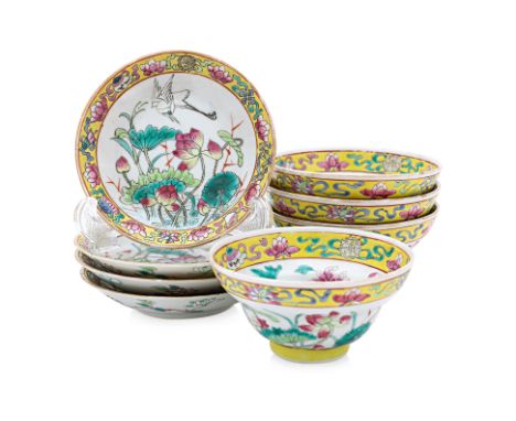 A SET OF FOUR 'IN & OUT' FAMILLE ROSE TEA BOWLS AND SAUCERS
The bowls, of ogee shape, decorated to the interior with a centra