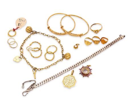 A GROUP OF CHILD'S GOLD AND SILVER JEWELLERY
Comprising: a pair of adjustable bangles, marked 22k and 'KCL'; three small ring