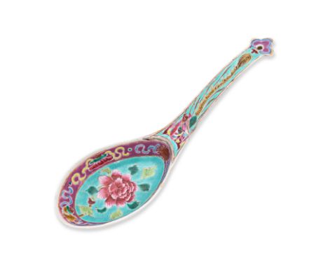 A TURQUOISE GROUND FAMILLE ROSE LADLE The bowl decorated in peony and a band of Buddhist emblems, handle of phoenix with styl