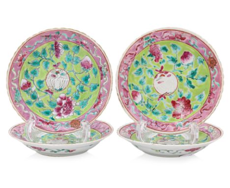 A GROUP OF FOUR LIME GREEN GROUND FAMILLE ROSE SAUCERS
Lime green ground decorated in peonies and peaches, central crane meda