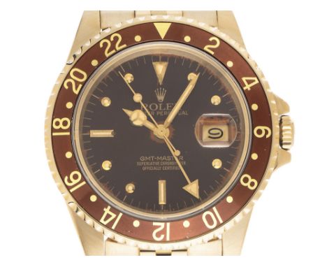 Rolex GMT Master Nipple198040 mmDial open 6/9, 40 mm, 18kt Gelbgold, Ziffernblatt in braun, gelbgoldene Zeiger, Plexiglas, Lü