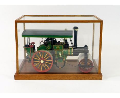 BANDAI STEAM ROLLER MODEL. An assembled Bandai 1/16th scale model steam roller in glazed case. Well built & painted.  Please 