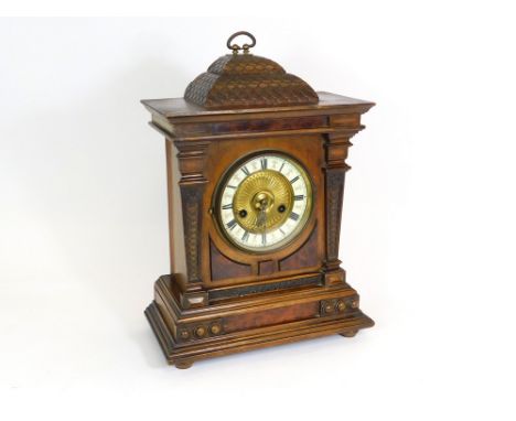 ARCHITECTURAL CLOCK. A Wurttemberg, 14 day strike, architectural mantle clock with mahogany & burrwood veneers. Max. height 4
