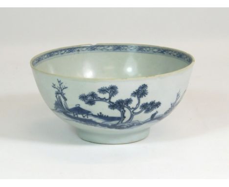 NANKING BOWL. A Nanking porcelain bowl from the Qianlong period, decorated with buildings & trees & a central figure in a lan