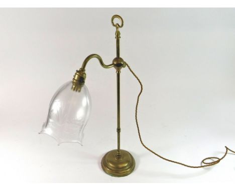 DESK LAMP. A brass adjustable desk lamp with cut glass shade. Max. height 55cm.  Please note that all items in this auction a