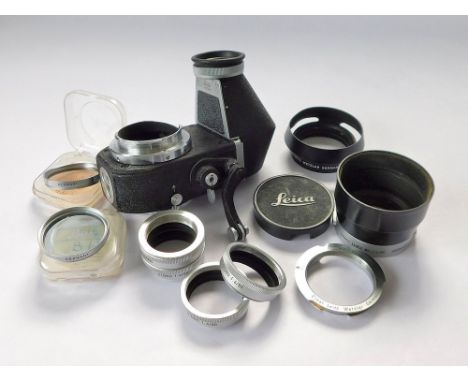 LEICA ACCESSORIES. A Visoflex II & viewfinder, four OTGNO 1:4/90 extension rings, two sun visors, a M2/M3 adaptor ring & two 