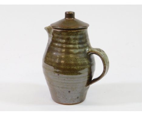 LEACH STANDARD WARE. A Leach Pottery Standard Ware coffee pot/soup jug. Impressed Pottery mark. Height 21cm.  Please note tha